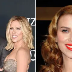 Scarlett Johansson and Colin Jost smiling on a red carpet.