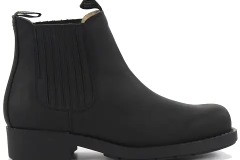 Svart chelseaboots i läder med dragflik baktill, märkta Johnny Bulls. Perfekta för en robust stil.