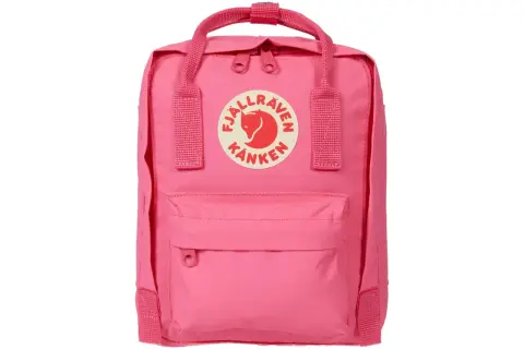 A pink Fjällräven Kånken Mini backpack with the brand's circular logo on the front.