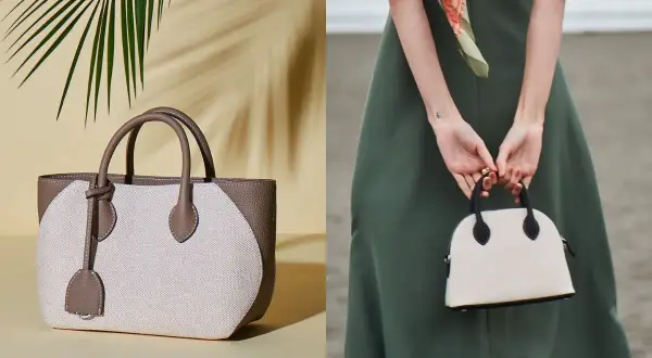 Två eleganta handväskor, en beige och brun tygväska med läderdetaljer, och en mindre vit kupolformad väska med svarta detaljer, som en baron necessär.