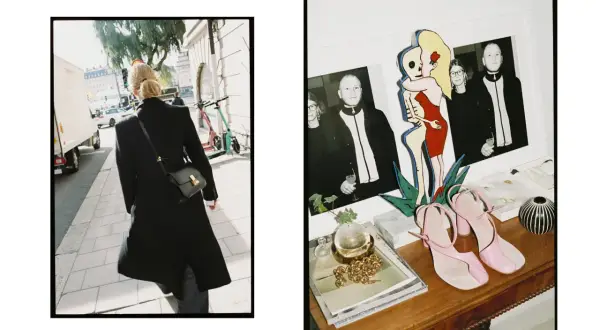 En kvinna i svart rock går på trottoaren i Stockholm. Bredvid syns en hylla med foton, en konstnärlig figur och rosa klackskor från Teurn Studios.