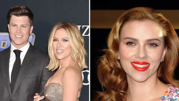 Scarlett Johansson and Colin Jost smiling on a red carpet.